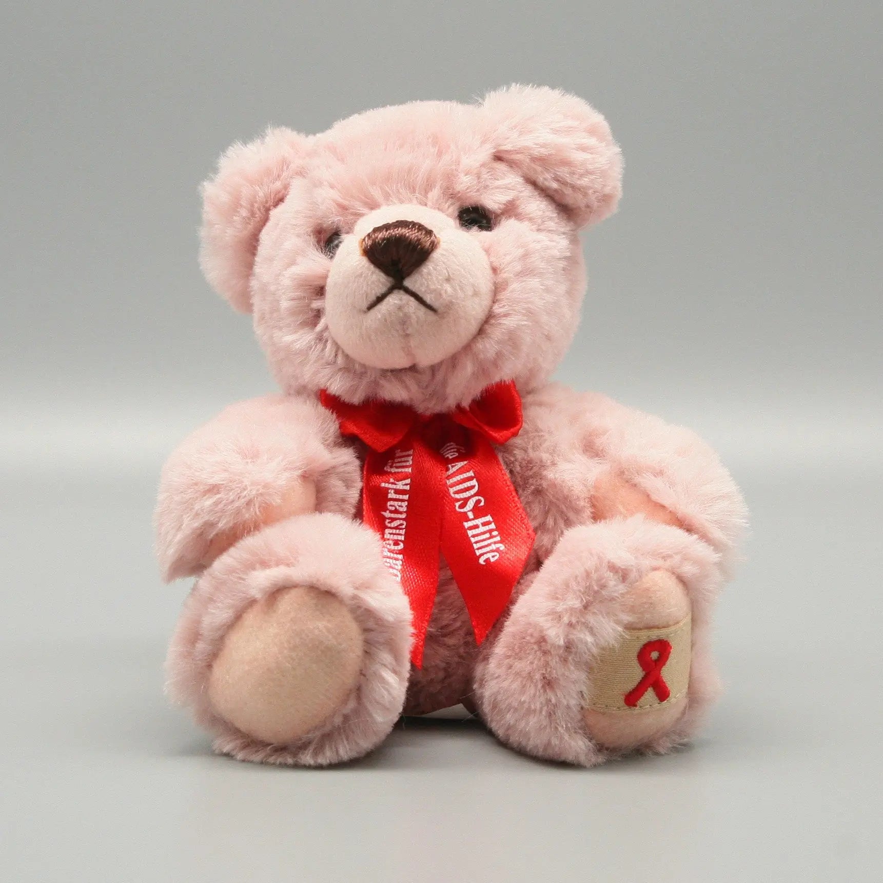 AIDS Teddy Bär - pridemerch.mom - Team Behinderte im Queer Cities e.V.