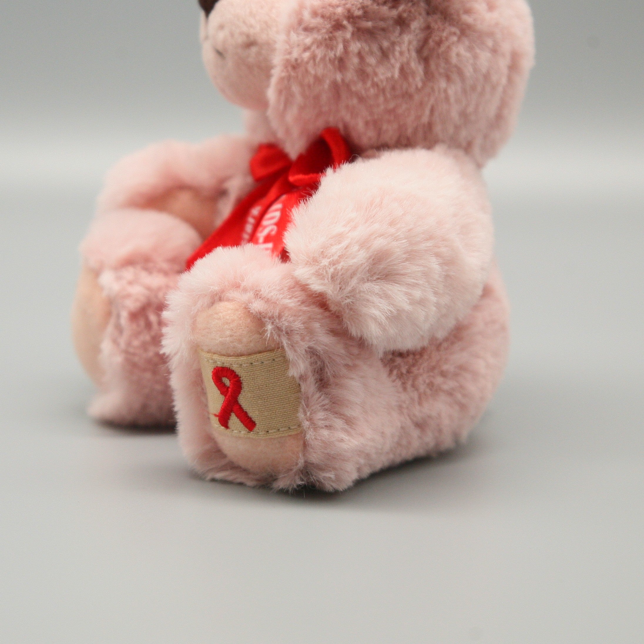 AIDS Teddy Bär - pridemerch.mom - Team Behinderte im Queer Cities e.V.