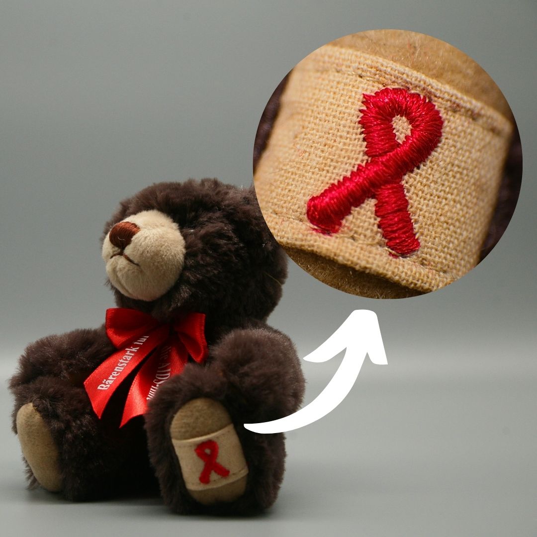 AIDS Teddy Bär - pridemerch.mom - Team Behinderte im Queer Cities e.V.