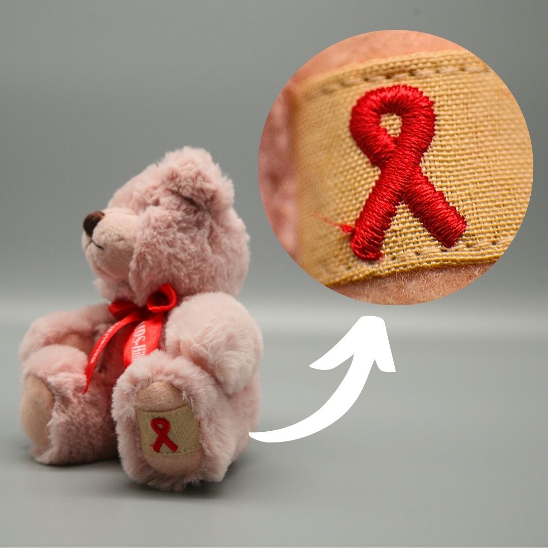 AIDS Teddy Bär - pridemerch.mom - Team Behinderte im Queer Cities e.V.